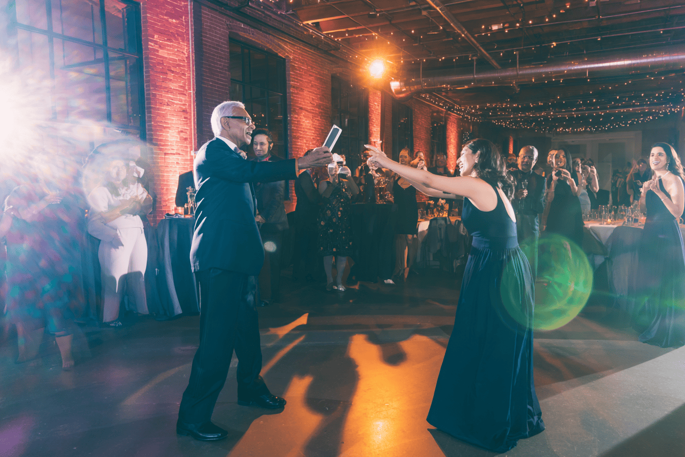 Nonprofit gala honoree receiving life story book